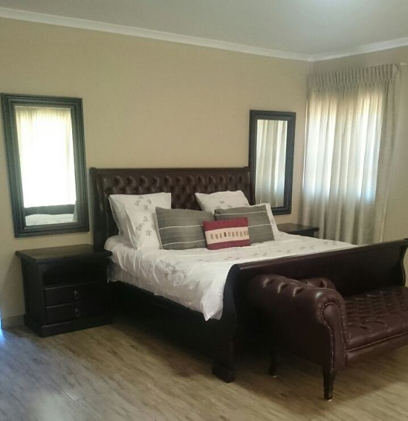 SLEIGH-BED-Leather-Upholstered